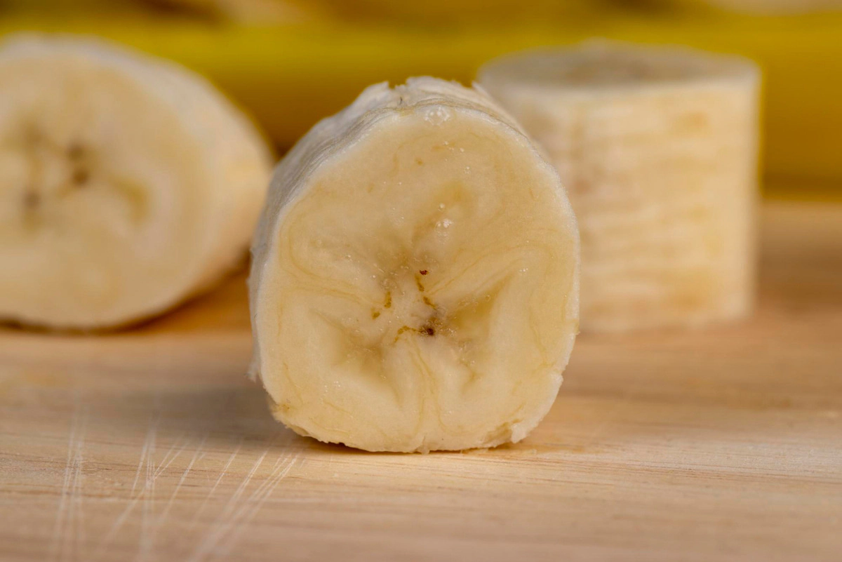 Banana slices on a cutting board