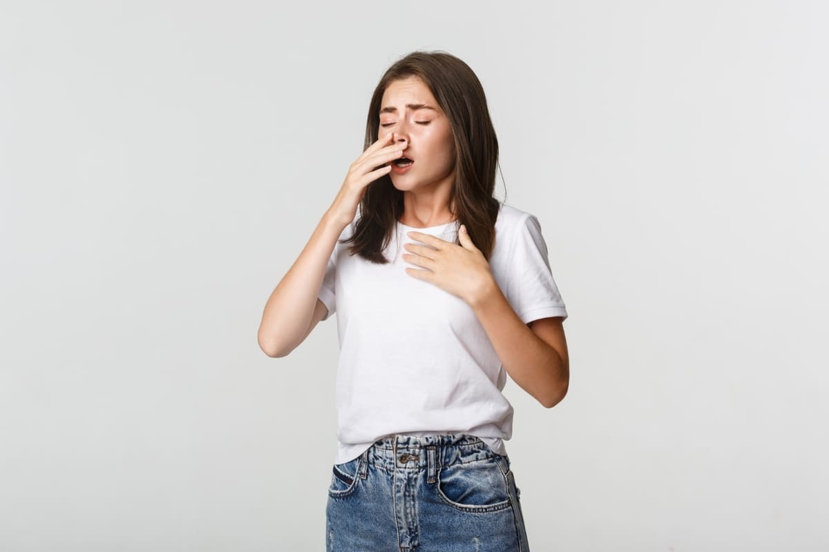 Woman about to sneeze