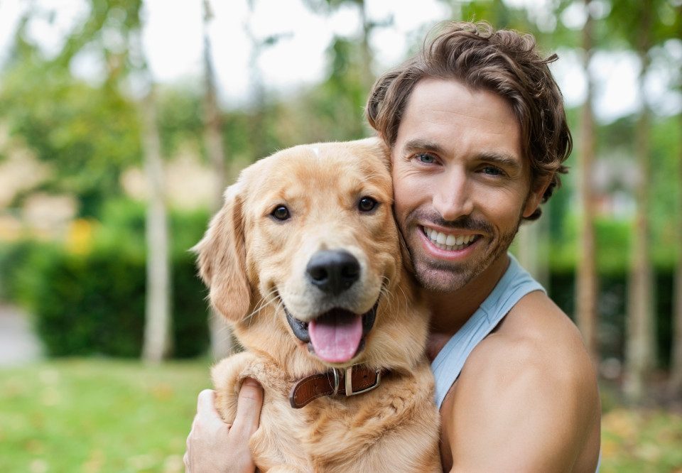 Dog smiling with its owner