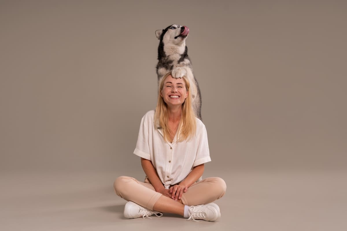 Dog and owner having a lot of fun together